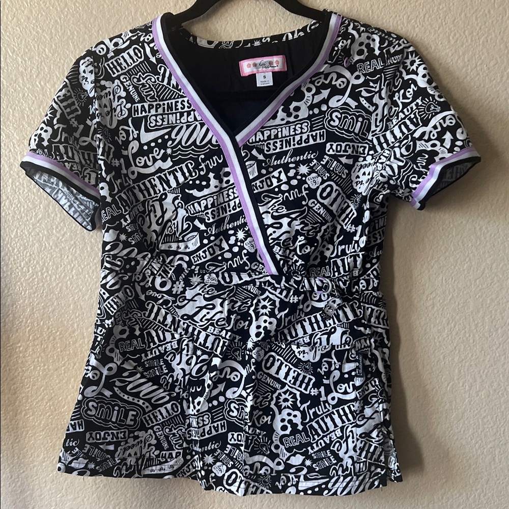 Koi Black and White Graphic Scrub top with Purple Trim